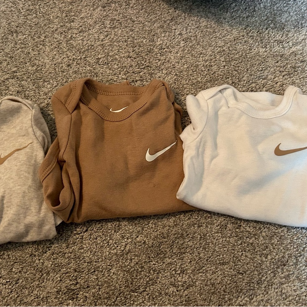 Nike Kids Onesies in Gray, Brown, and White